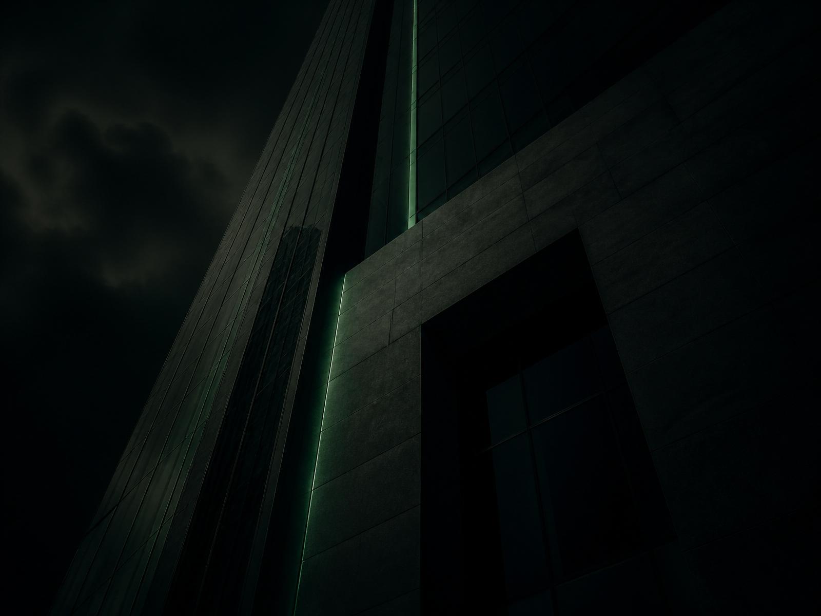 Modern law firm headquarters at dusk